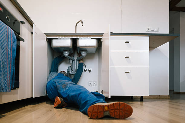 Professional Plumbing technician working in Stow, MA